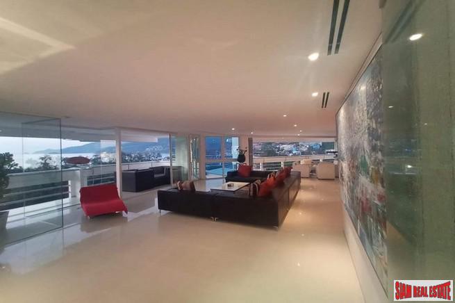 Andaman Beach Suites | Deluxe Modern Condo at World Famous Patong Beach, Phuket