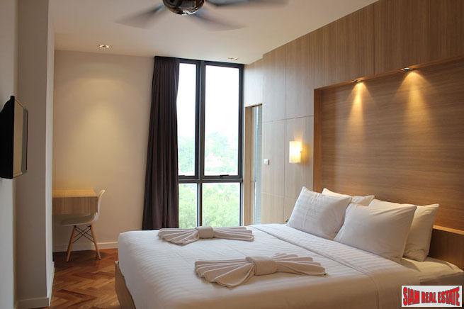 Icon Park Condominium | Two Bedroom Kamala Duplex with Large Open Windows and Green Views