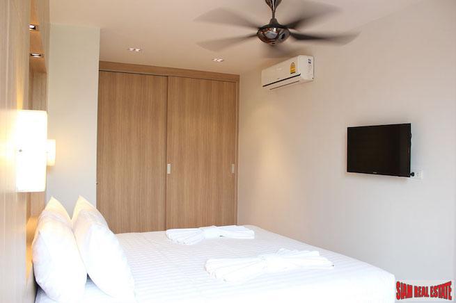 Icon Park Condominium | Two Bedroom Kamala Duplex with Large Open Windows and Green Views