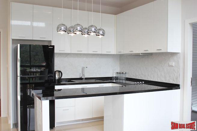 Icon Park Condominium | Two Bedroom Kamala Duplex with Large Open Windows and Green Views