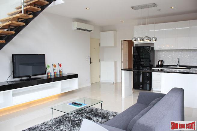 Icon Park Condominium | Two Bedroom Kamala Duplex with Large Open Windows and Green Views